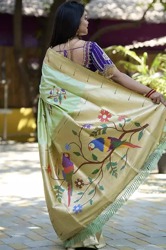 Mint green paithani silk blend saree with floral & peacock motifs