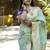 Mint green paithani silk blend saree with floral & peacock motifs