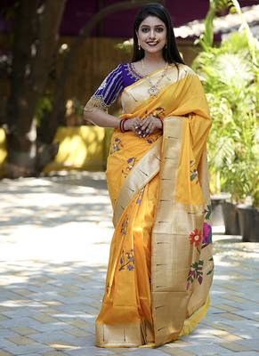 Mustard paithani silk blend saree with floral & peacock motifs 1
