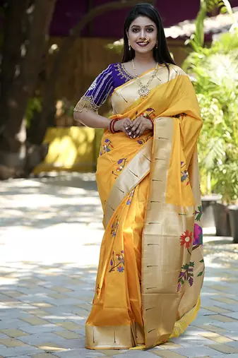 Mustard paithani silk blend saree with floral & peacock motifs