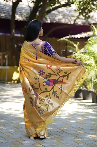Mustard paithani silk blend saree with floral & peacock motifs