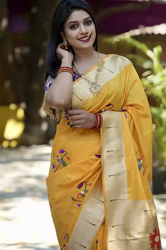 Mustard paithani silk blend saree with floral & peacock motifs