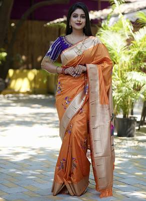Orange paithani silk blend saree with floral & peacock motifs 1