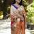 Orange paithani silk blend saree with floral & peacock motifs