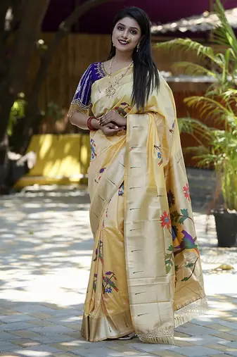 Cream paithani silk blend saree with floral & peacock motifs
