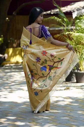 Cream paithani silk blend saree with floral & peacock motifs