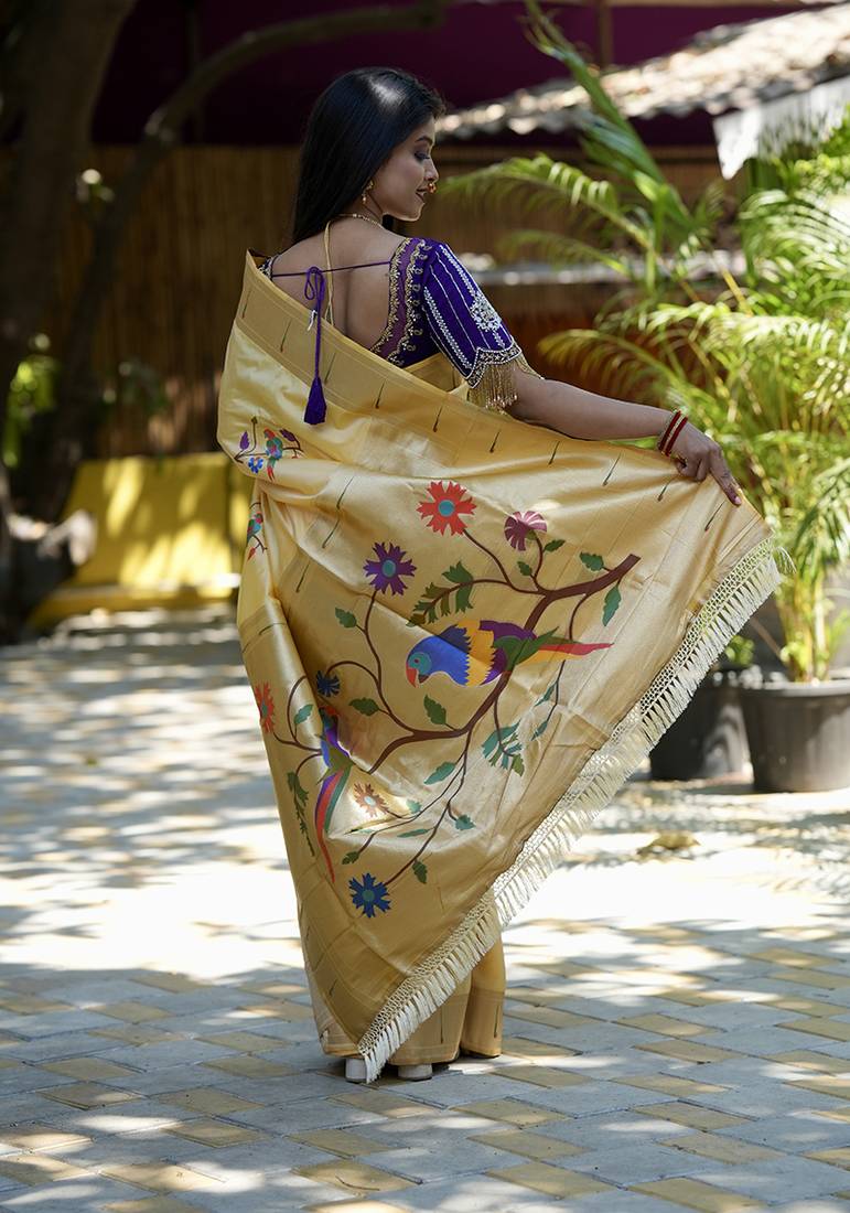 Cream paithani silk blend saree with floral & peacock motifs