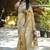 Cream paithani silk blend saree with floral & peacock motifs