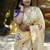 Cream paithani silk blend saree with floral & peacock motifs