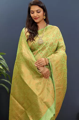 light parrot green & gold woven banarasi silk blend saree with rich zari border