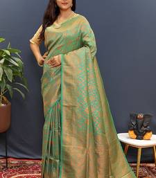 sea green & gold woven banarasi silk blend saree with rich zari border