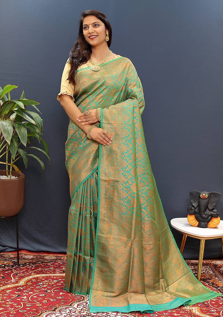 sea green & gold woven banarasi silk blend saree with rich zari border
