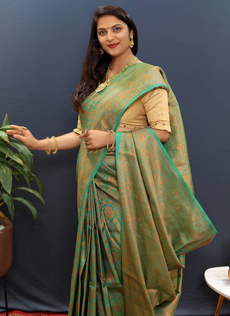 sea green & gold woven banarasi silk blend saree with rich zari border