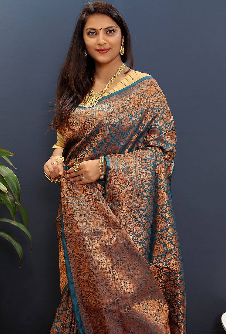 teal blue & gold woven banarasi silk blend saree with rich zari border