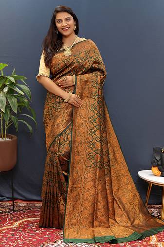 dark green & gold woven banarasi silk blend saree with rich zari border