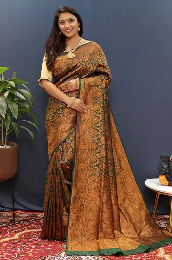 dark green & gold woven banarasi silk blend saree with rich zari border