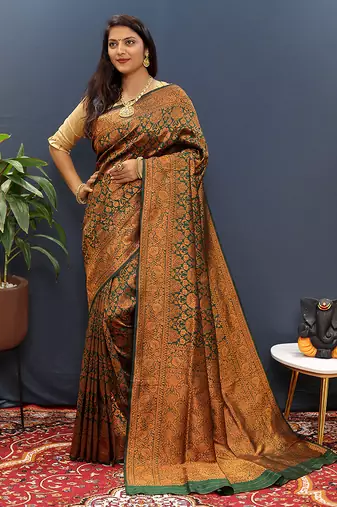 dark green & gold woven banarasi silk blend saree with rich zari border