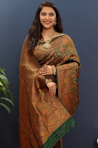 dark green & gold woven banarasi silk blend saree with rich zari border