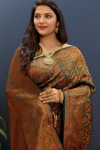 dark green & gold woven banarasi silk blend saree with rich zari border