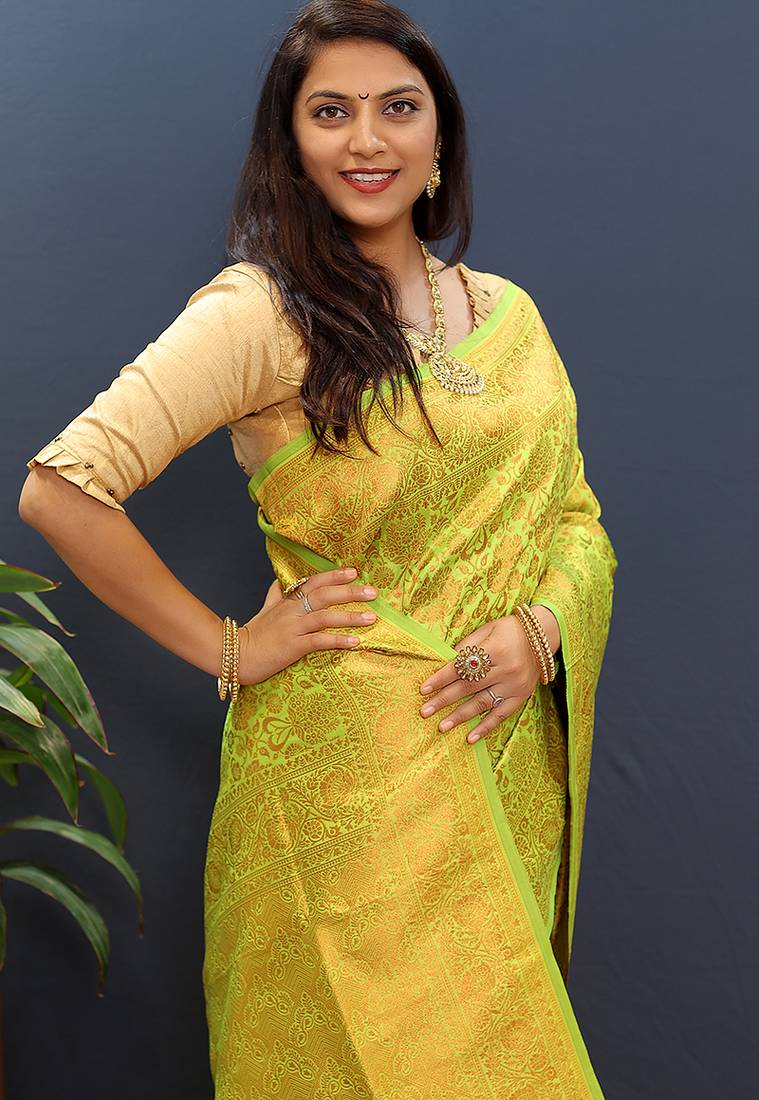 lemon green & gold woven banarasi silk blend saree with rich zari border