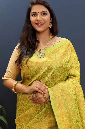 lemon green & gold woven banarasi silk blend saree with rich zari border