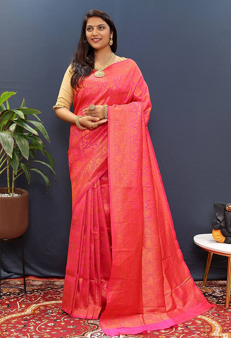 rani pink & gold woven banarasi silk blend saree with rich zari border