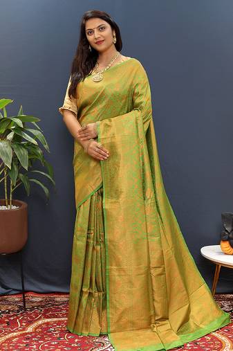 green & gold woven banarasi silk blend saree with rich zari border