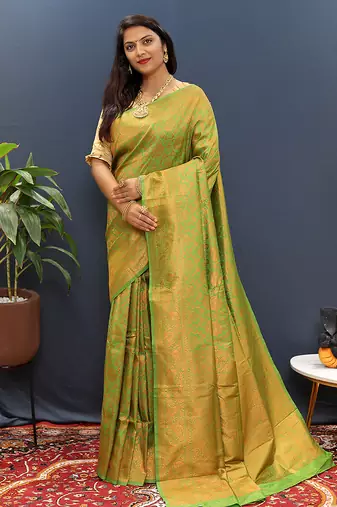 green & gold woven banarasi silk blend saree with rich zari border