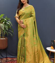 green & gold woven banarasi silk blend saree with rich zari border