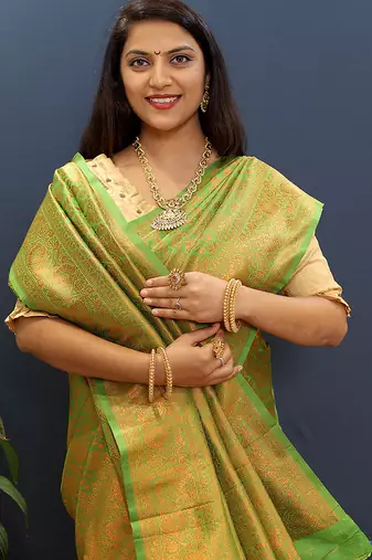 green & gold woven banarasi silk blend saree with rich zari border