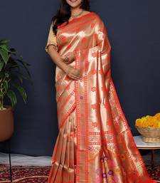 Rose gold silk blend saree with red floral zari weaving & rich brocade pallu