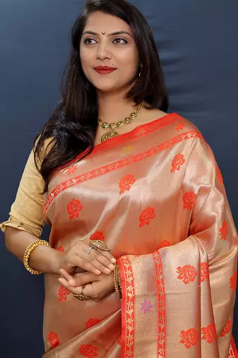 Rose gold silk blend saree with red floral zari weaving & rich brocade pallu