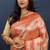 Rose gold silk blend saree with red floral zari weaving & rich brocade pallu