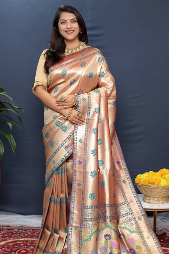 Rose gold silk blend saree with teal floral zari weaving & rich brocade pallu