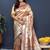 Rose gold silk blend saree with teal floral zari weaving & rich brocade pallu