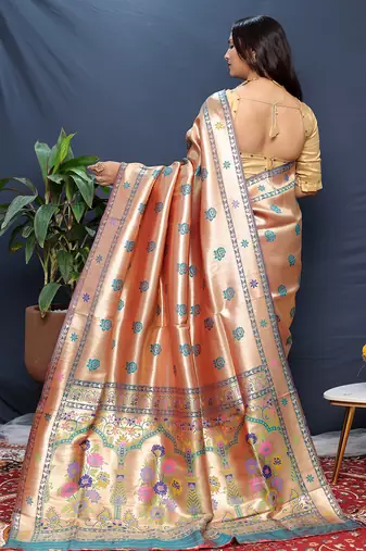 Rose gold silk blend saree with teal floral zari weaving & rich brocade pallu