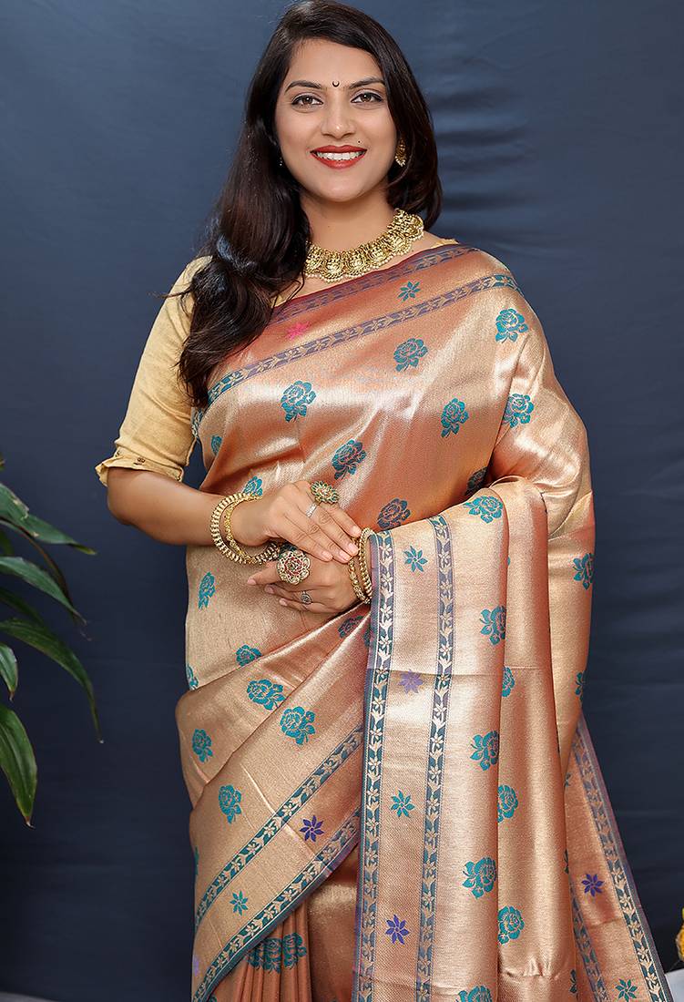 Rose gold silk blend saree with teal floral zari weaving & rich brocade pallu