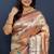 Rose gold silk blend saree with teal floral zari weaving & rich brocade pallu