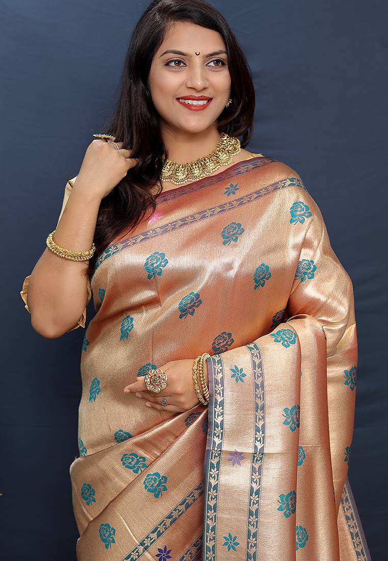 Rose gold silk blend saree with teal floral zari weaving & rich brocade pallu