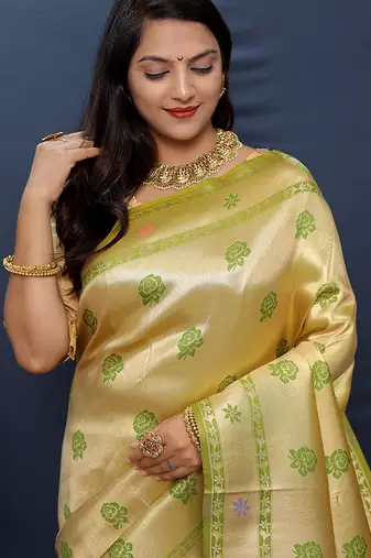 Beige gold silk blend saree with light green floral zari weaving & rich brocade pallu