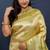 Beige gold silk blend saree with light green floral zari weaving & rich brocade pallu