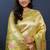 Beige gold silk blend saree with light green floral zari weaving & rich brocade pallu
