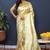 Beige gold silk blend saree with cyan floral zari weaving & rich brocade pallu