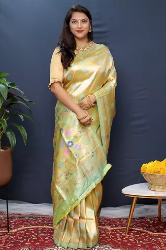 Beige gold silk blend saree with cyan floral zari weaving & rich brocade pallu