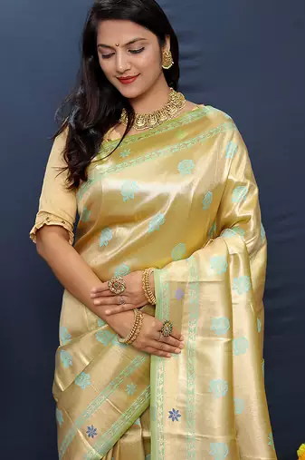 Beige gold silk blend saree with cyan floral zari weaving & rich brocade pallu