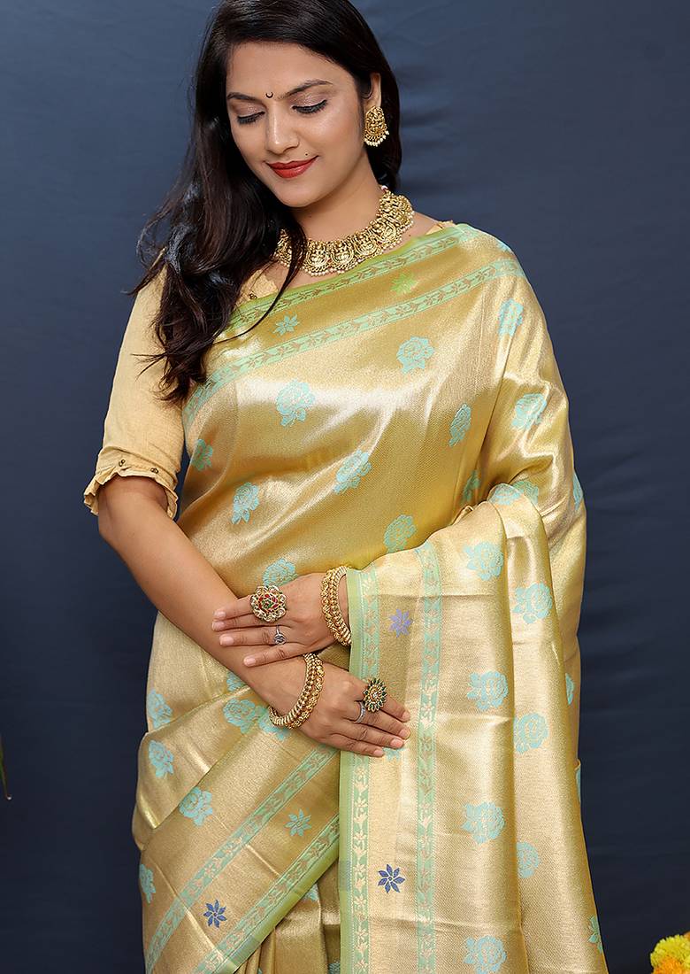 Beige gold silk blend saree with cyan floral zari weaving & rich brocade pallu