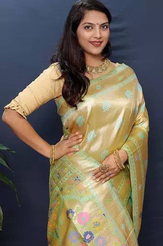 Beige gold silk blend saree with cyan floral zari weaving & rich brocade pallu