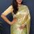 Beige gold silk blend saree with cyan floral zari weaving & rich brocade pallu