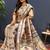 Beige gold silk blend saree with navy blue floral zari weaving & rich brocade pallu