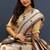 Beige gold silk blend saree with navy blue floral zari weaving & rich brocade pallu